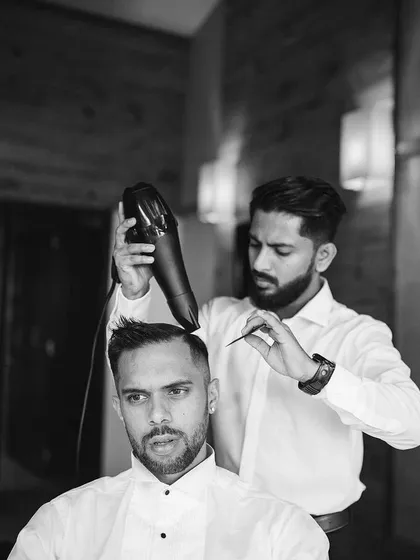 Making sure my friend and client, footballer Robin Singh, looked his absolute best on his wedding day. I offer mobile wedding day barber services for grooms and their parties, providing detailed styling and grooming right at the venue.