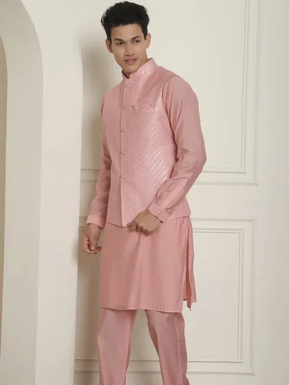 Another angle of the pink kurta jacket set, showing its clean lines and perfect fit. It's an easy and stylish choice for any last-minute wedding invitation.