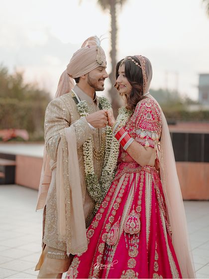 A playful and loving pinky promise, a small, intimate gesture that speaks volumes about their unique bond.