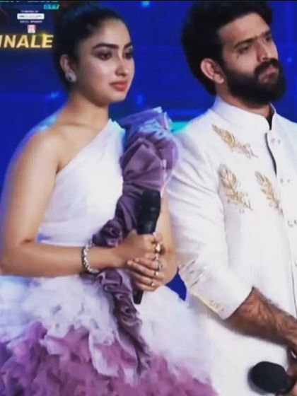 For the Bigg Boss OTT Finale, Saanya Iyer wore this custom-designed white and purple ruffled one-shoulder gown. It’s a high-fashion piece perfect for red carpet events and grand finales.