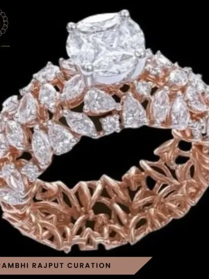 Craftsmanship is at the heart of my work. This intricate ring, with its floral-inspired lattice of rose gold and a brilliant solitaire surrounded by marquise diamonds, is a showcase of detailed artistry and premium design.
