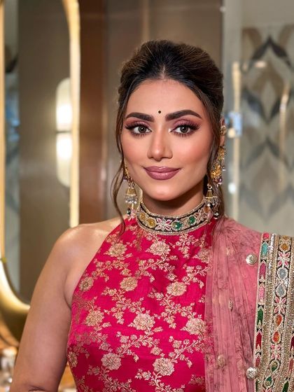 Another angle of this stunning mehendi look. The makeup is designed to last through hours of dancing and celebration.