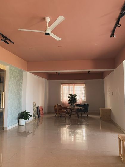 The sitting area is a quiet spot for reflection or sketching out new ideas. We've found that having a comfortable space away from the wheel is essential for the creative process.