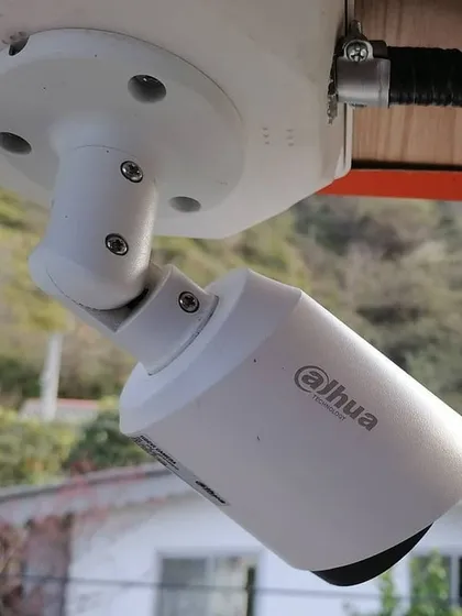 A close-up of a Dahua bullet camera installation. We ensure every camera is securely mounted and precisely angled to capture the most critical surveillance areas for your home or business.