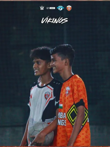 The Viking energy. Two teammates sharing a laugh during a break in training.