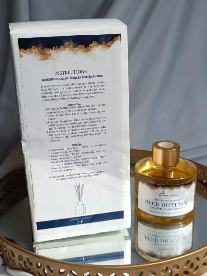 The back of the packaging provides clear instructions and benefits. It explains how to use the diffuser and highlights its long-lasting, flame-free, and handmade qualities.