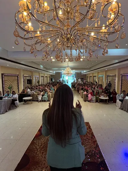 Addressing a full house of aspiring artists. My mission is to empower every single person in the room to rise and win.