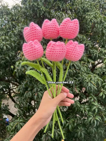 A handful of soft pink tulip stems.