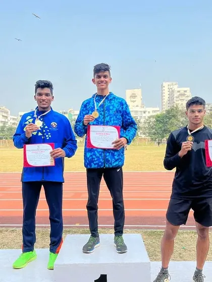 The 4x400m relay team celebrating their gold medal win at the Mumbai University Zonal Athletics Meet.