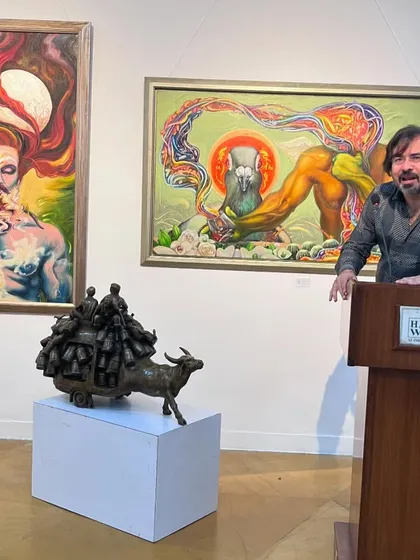 Sharing a moment during my talk at the Visual Arts Gallery. Engaging with the audience is a key part of the exhibition experience.