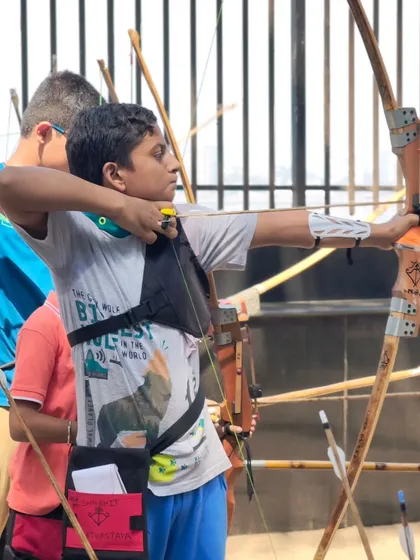 A young boy at full draw, showing great potential. Our trials are a platform for such talent to shine.