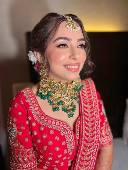 A happy bride is the best review. Akshita's radiant smile shows her confidence and joy on her wedding day.