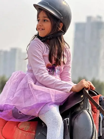This young rider looks like a princess on her horse. Our location is perfect for themed kids' photoshoots, from fairytale concepts to action-packed equestrian portraits.