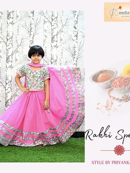 A full-length view of the Rakhi special pink cotton lehenga. The wide, bordered skirt is designed for a beautiful flare, allowing for easy movement during festival celebrations.