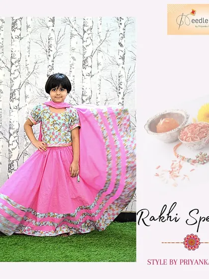A full-length view of the Rakhi special pink cotton lehenga. The wide, bordered skirt is designed for a beautiful flare, allowing for easy movement during festival celebrations.