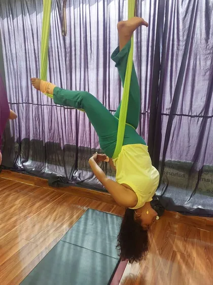 The fomo was real for those who missed this weekend's class. A student hangs in an inverted pose, a staple of our fun and challenging sessions.