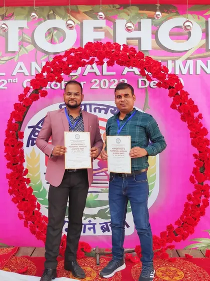 Posing with a fellow alumnus and our certificates of appreciation. These moments celebrate our collective journey and the spirit of "हमीं नवोदय हों".