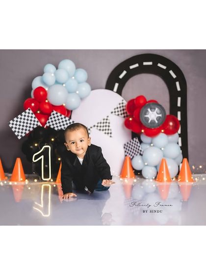 This little racer is on the move! A crawling shot during a first birthday session captures their new mobility and curiosity.