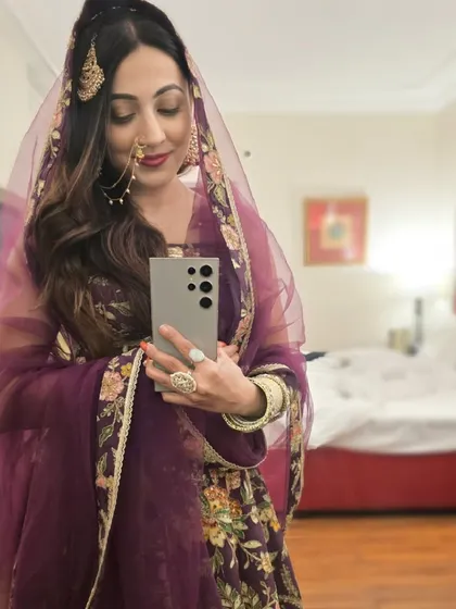 A traditional look with a nath and maang tikka. I can effortlessly switch between modern gowns and classic Indian bridal wear.