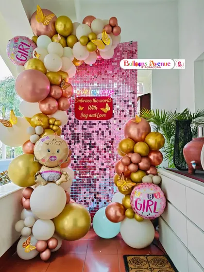 A clear, centered shot of the "Welcome Baby Girl" setup.