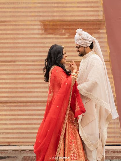 We believe your wardrobe is a feeling to be cherished, not a costume. This moment captures the natural, easy chemistry between the couple.