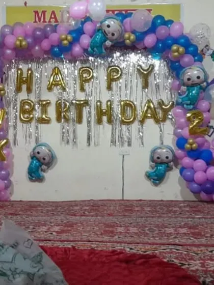Another view of the home birthday backdrop, showing the full arrangement. We can adapt our designs to fit any space, big or small.