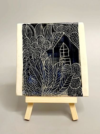 Another look at the sgraffito house tile, a unique piece of art to decorate your walls or tabletops. Visit my website to see the full collection of ceramic tiles.