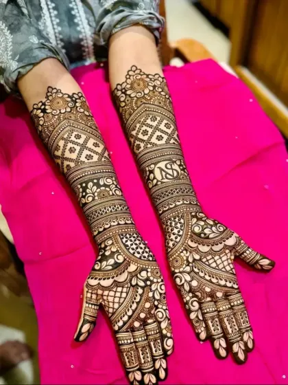 This intricate design includes the couple's initials hidden within the pattern. It's a fun and personal touch that I love adding for my brides.