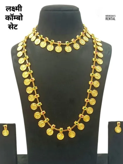 A traditional "Lakshmi" coin necklace set, featuring embossed figures of the goddess. This is a very auspicious design for weddings.