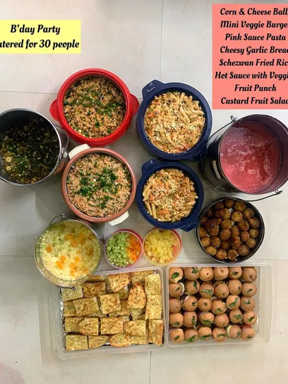 This was a fun birthday party I catered for 30 people. The menu included crowd-pleasers like Jain Pink Sauce Pasta, Schezwan Fried Rice, Mini Veggie Burgers, and Corn & Cheese Balls.