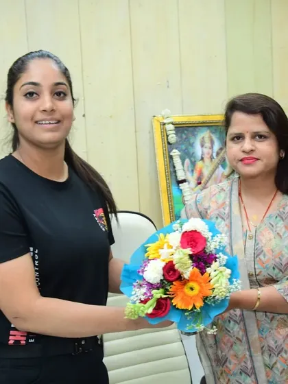 Our female instructors are leaders in empowerment. Here, one of our warriors is honored for her work in training students.