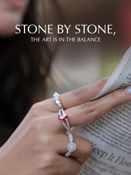 Stone by stone, the art is in the balance. This image shows a collection of my custom diamond and ruby rings stacked together, each one designed with intention. The V-shape contour band is made to perfectly complement the other rings.
