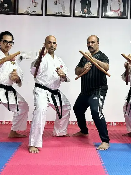 My senior instructors and I practicing with Tonfa alongside visiting Sensei Jabir. Continuous learning is crucial, even for teachers.