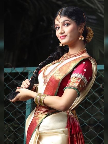 A playful and happy shot of the Murtham bride, showing how the makeup looks beautiful even in candid moments.