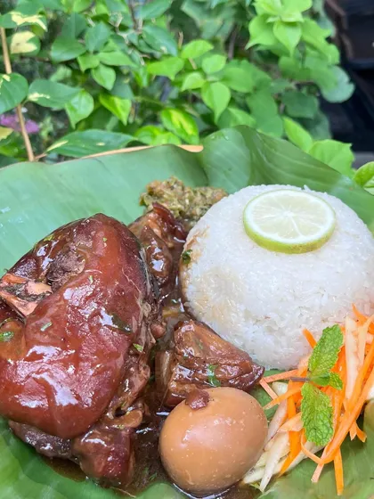 Our weekend special, Sweet Pork Knuckles. The meat is slow-cooked until it's fall-off-the-bone tender, served with sticky rice, a hard-boiled egg, and a fresh salad chutney.