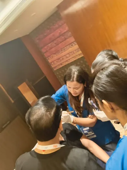 Hands-on training sessions are invaluable. Here I am demonstrating an injectable technique to fellow doctors during a workshop. Practical learning ensures we can deliver the best and safest results for our patients.