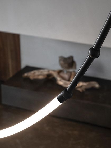 A close-up of the Leda system, showing the detail of the small spheres that connect the glowing silicone tubes.