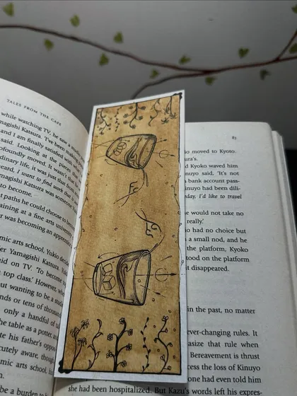 Another example of the back of a bookmark, showing how I use fine-line details and coffee painting to create a beautiful, abstract design.