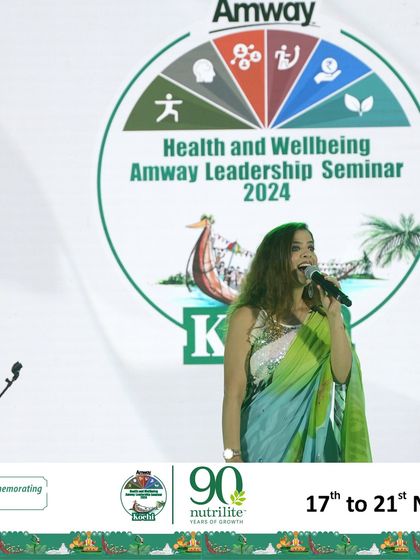 Another shot from the Amway stage, with the event branding clearly visible.