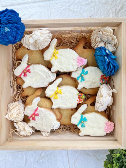 Our adorable Easter Bunny Cookies are a festive treat for the holiday. These shortbread cookies are dipped in white chocolate and decorated with colorful sprinkles.