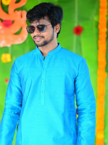 Adding some style with sunglasses during the festive occasion.