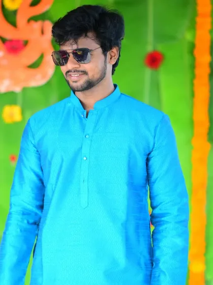 Adding some style with sunglasses during the festive occasion.