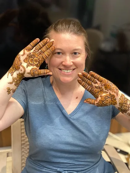 A happy international client showing off her Indo-Arabic mehendi. I love sharing the art of henna with people from all over the world.