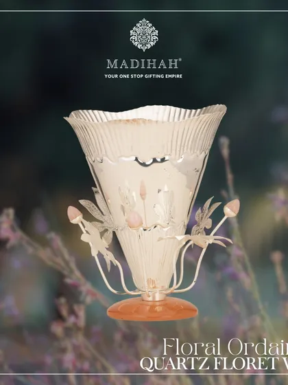 Our Floral Ordained Quartz Floret Vase, a distinguished piece from the Silvered Collection. Adorned with rose quartz and silver-finished floral details, it is the epitome of refined elegance.