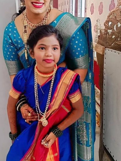 Twinning in tradition! A mother and daughter duo looking adorable in matching Maharashtrian jewellery, perfect for family functions.