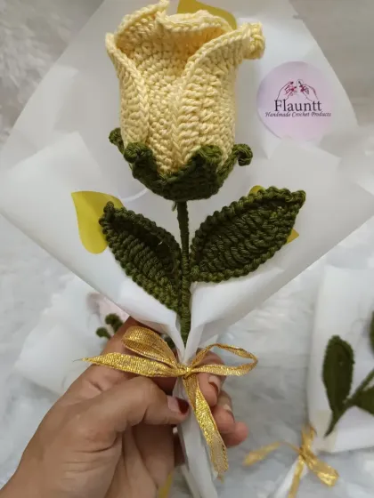 The yellow rose bouquet I made for Teacher's Day. It was my first time trying to make a floral bouquet, even if it was just for one rose.