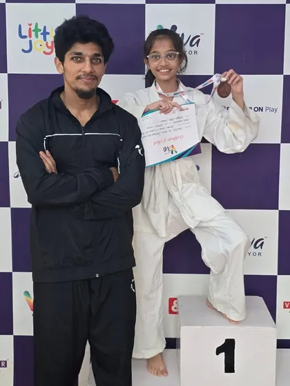 A female student takes the top spot on the podium, a proud moment for her and for Team XMF.