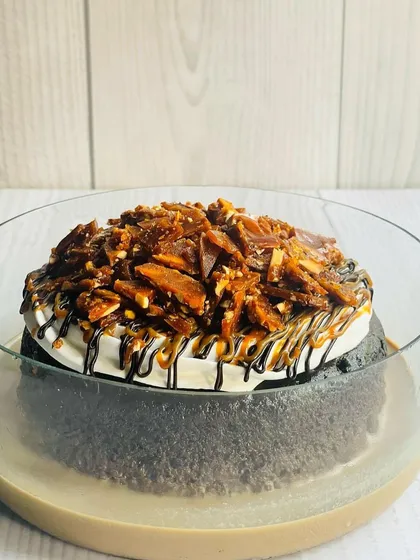 This is my Mocha Caramel Almond Praline Tres Leches. The combination of coffee, gooey caramel, and crunchy almond praline makes every bite a magical experience.