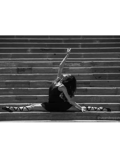 A graceful pose showing the lines and artistry of a trained dancer. I bring this focus on form and posture to all my students, helping them look their best.