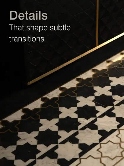 The smallest details often tell the biggest stories. For the Soaltee Hotel, we used bold, geometric floor patterns to guide guests and create subtle transitions between spaces. This reinterpretation of traditional Nepalese motifs in a modern palette of black and white marble with brass inlays is central to the lobby's narrative.